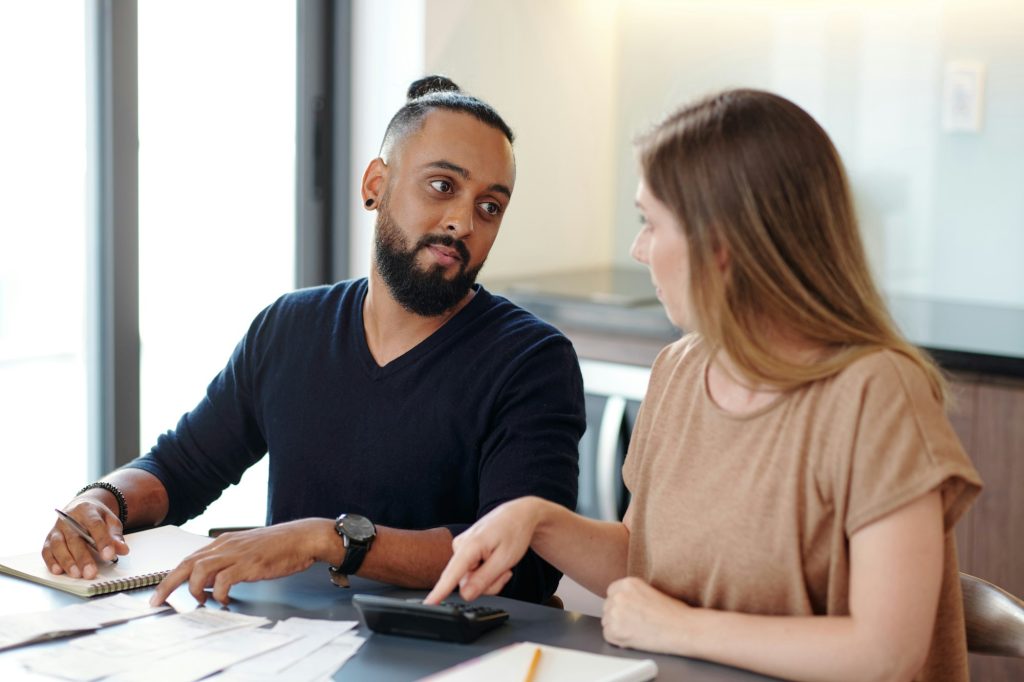 Couple Discussing Family Budget